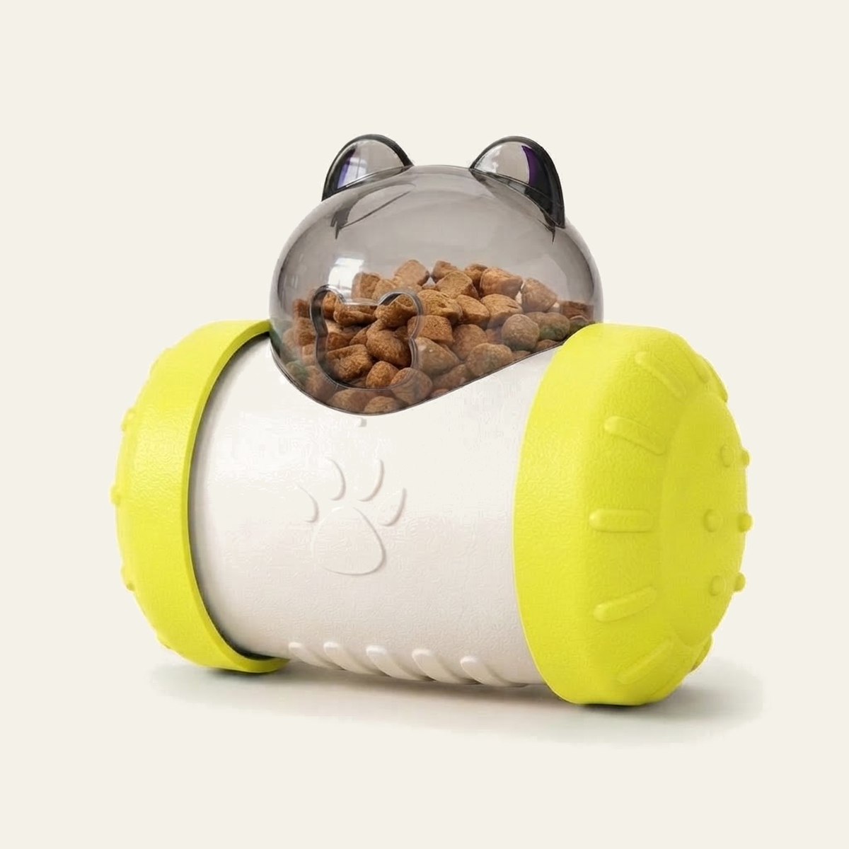 Distributeur de croquettes culbuto pour chat coloris jaune : corps blanc, flasques jaunes et dôme transparent à oreilles rempli de croquettes