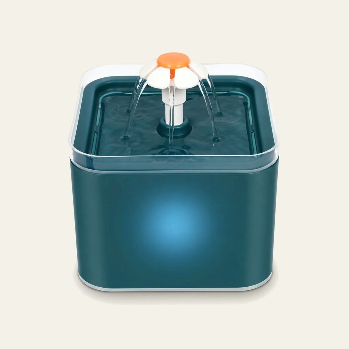 Fontaine à eau pour chat coloris bleu pétrole : réservoir carré bleu-vert, rebord transparent et fleur blanche à cœur orange d'où l'eau retombe en cascade