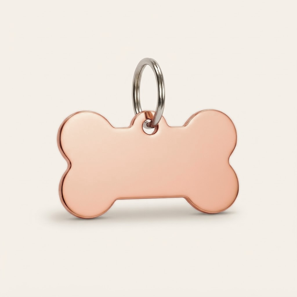 Médaille gravable en forme d'os rose gold avec anneau en acier